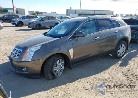 2014 Cadillac Srx Luxury Collection z USA, uszkodzony, nr VIN 3GYFNBE34ES666413